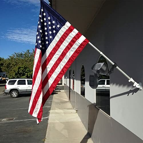 American flag mounted on a building wall.